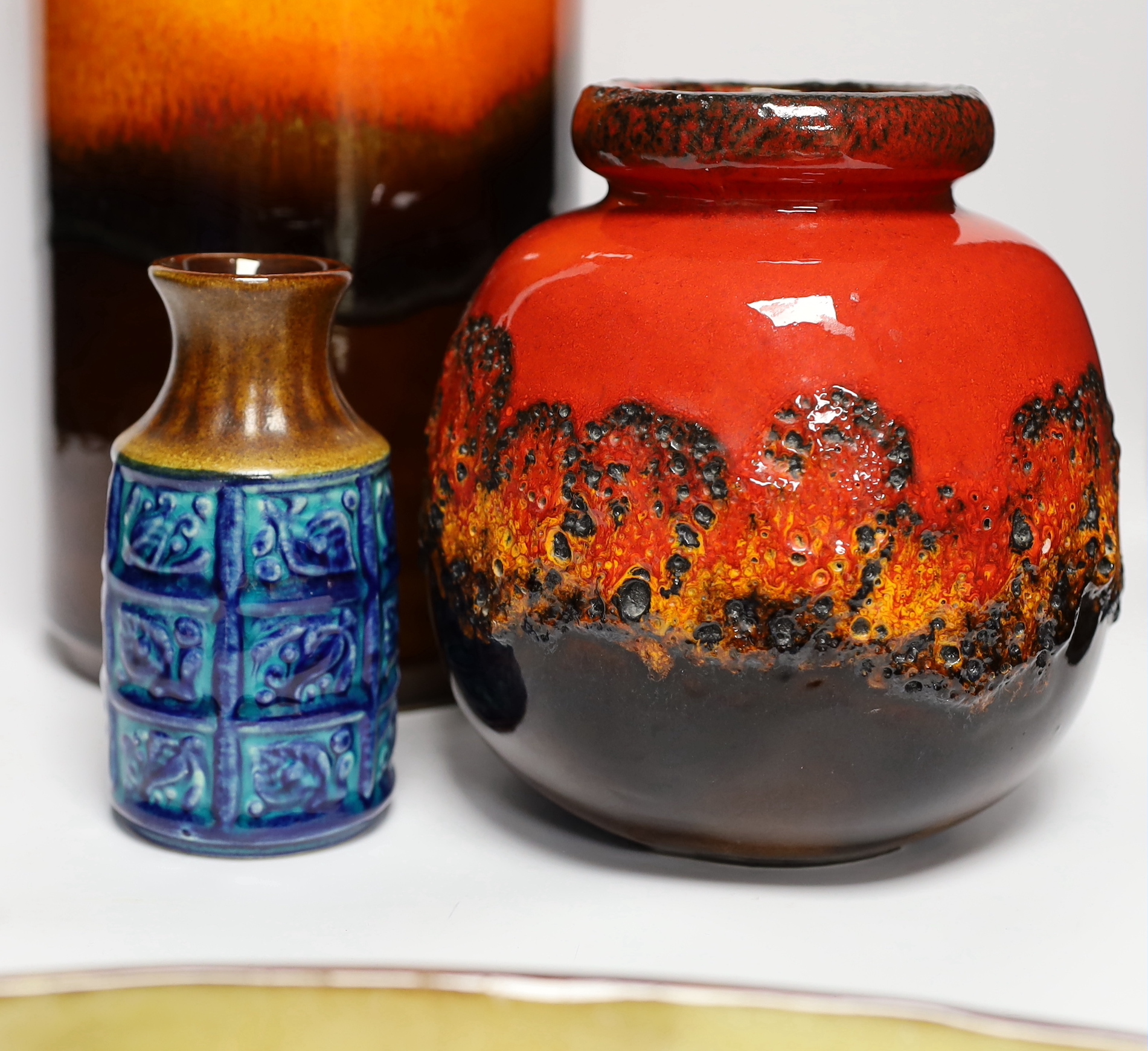 Five mid century pottery pieces including a Joyce Morgan 'cat' tray, an Adderley blue ground vase, and three W. German vases including 'Fat Larva' vase, tallest 42cm